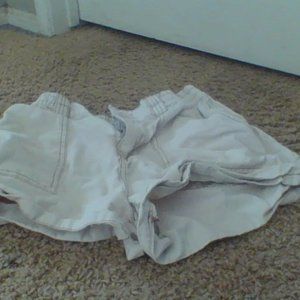full tilt , size small , cream color with brown stitching.